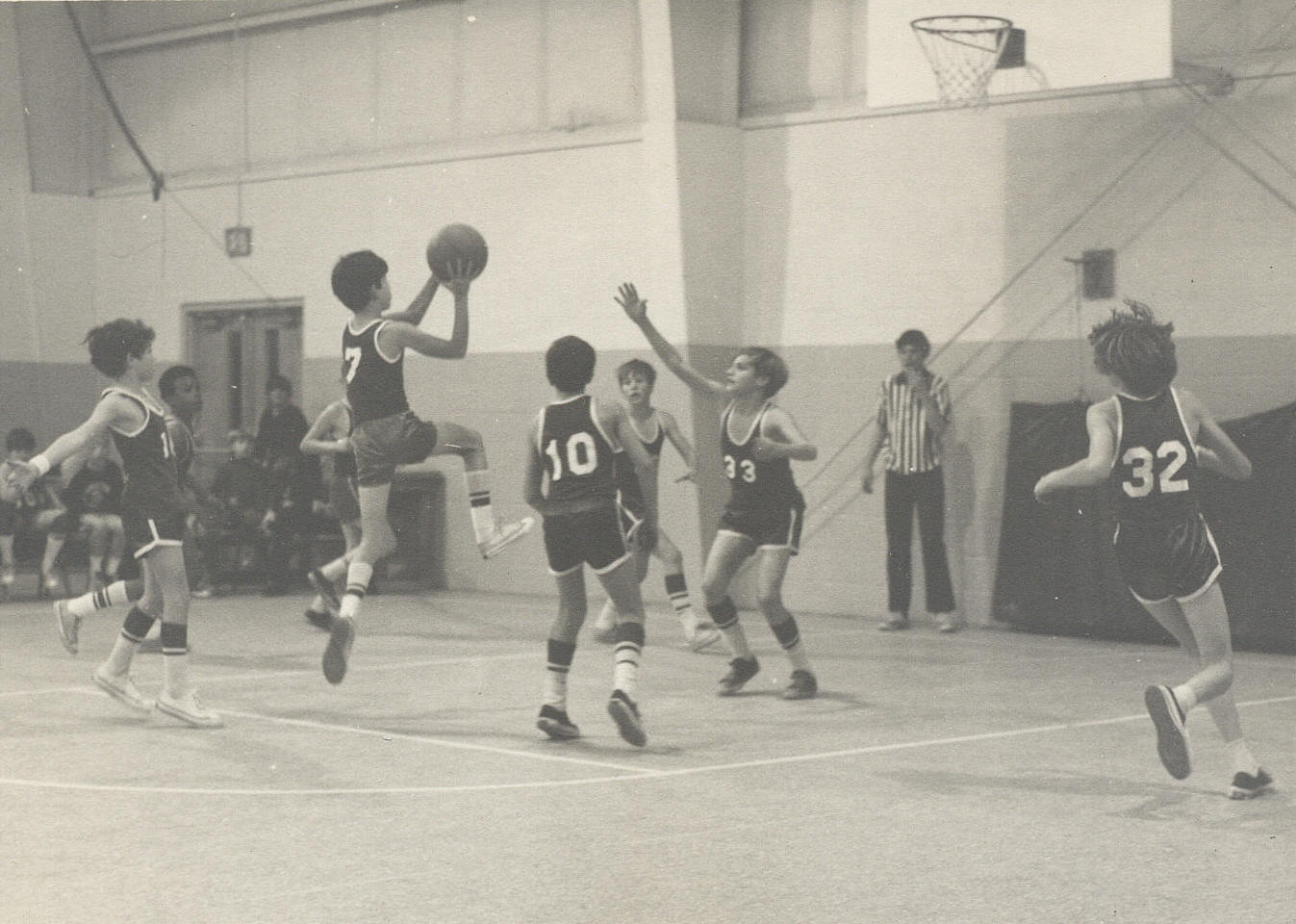 Thumper Newman playing basketball